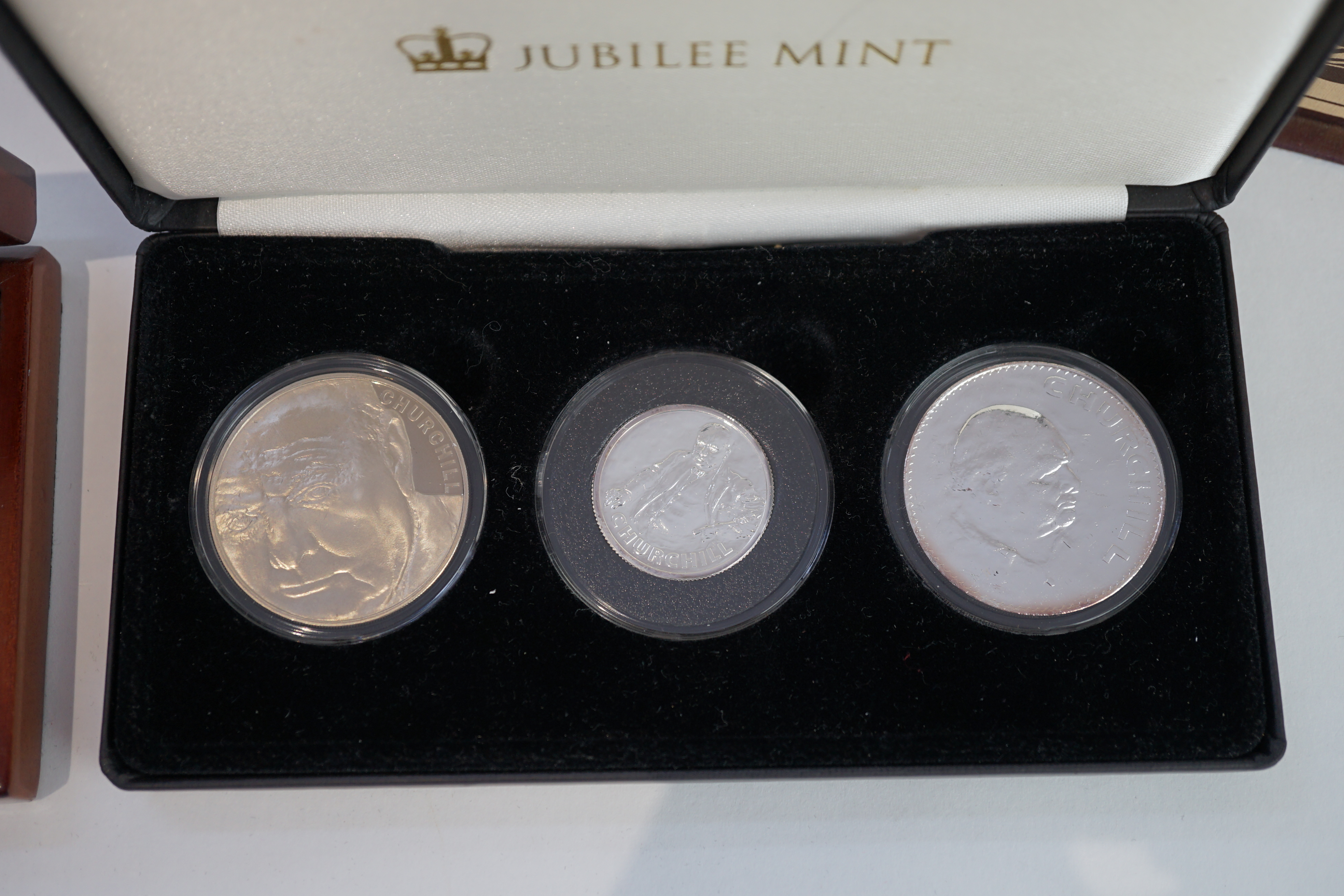 Commemorative coins, Elizabeth II, Bailiwick of Guernsey proof silver £5 Battle of the Somme 2016, a Tristan de Cunha proof silver one crown 2015, Churchill proof silver £20, 2015, cased with two other Churchill coins, a